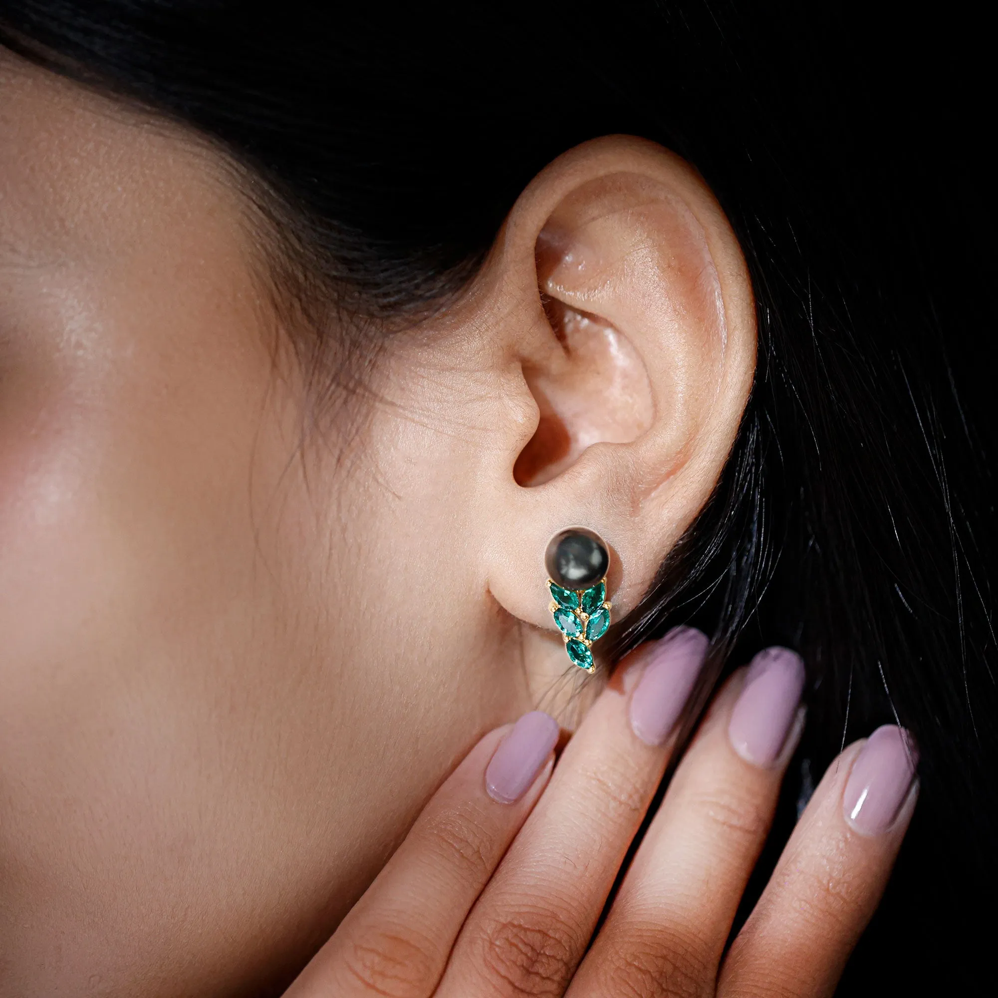 Nature Inspired Black Pearl Stud Earrings with Emerald Leaf Motifs